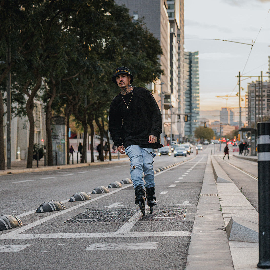 Man sliding on street with Flying Eagle Eclipse urban inline skate