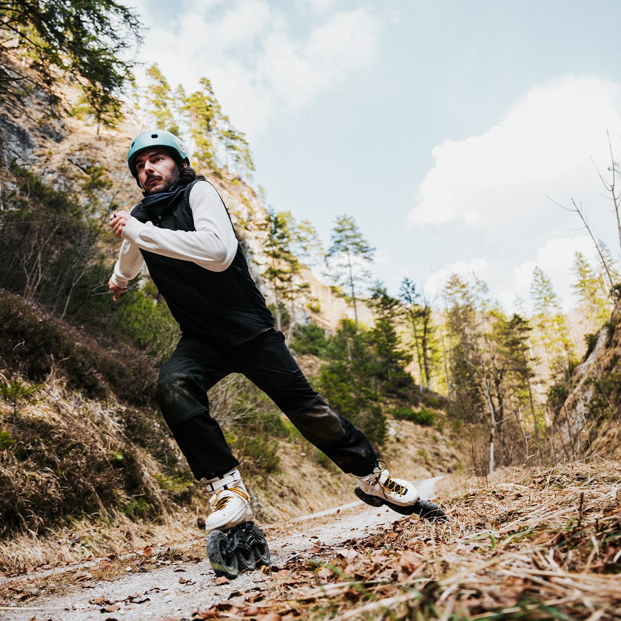 Man hiking on a trail with FlyingEagle TERRA TIRE 150mm black offroad frame