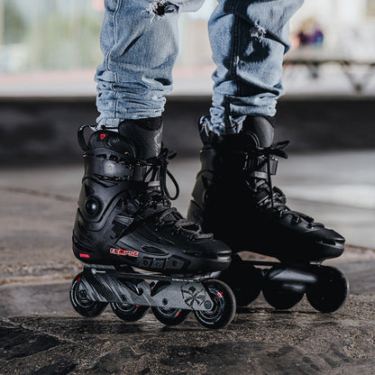 Person wearing black Flying Eagle Eclipse inline skates