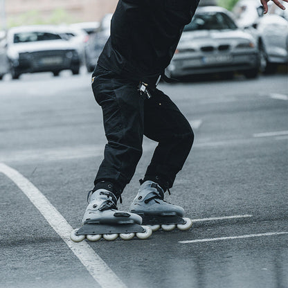 Skater practicing flatland moves with 5 wheels FlyingEagle SHRIKE Pro R5 outdoors
