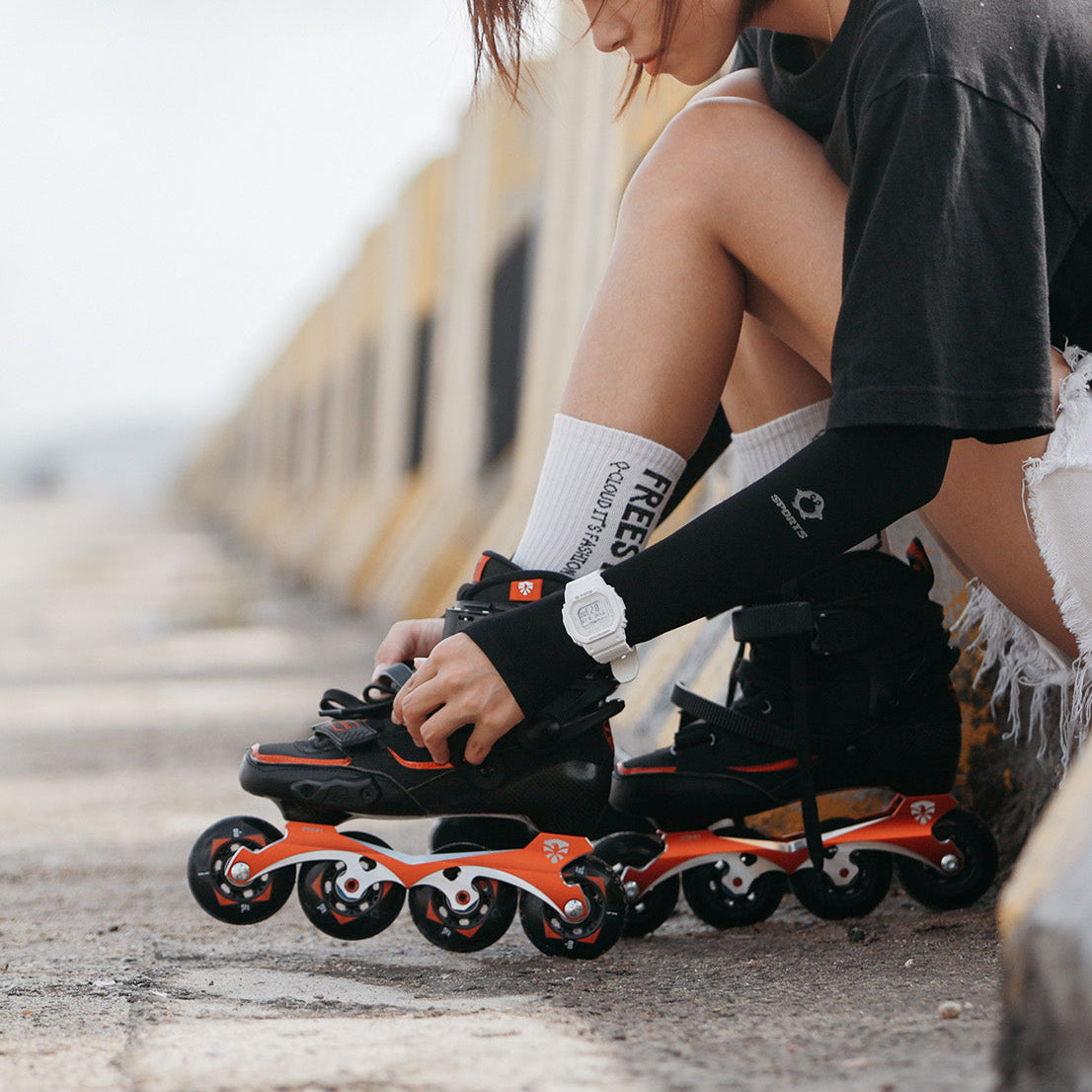 Skater performing slalom with FlyingEagle DRIFT 2 carbon inline skates
