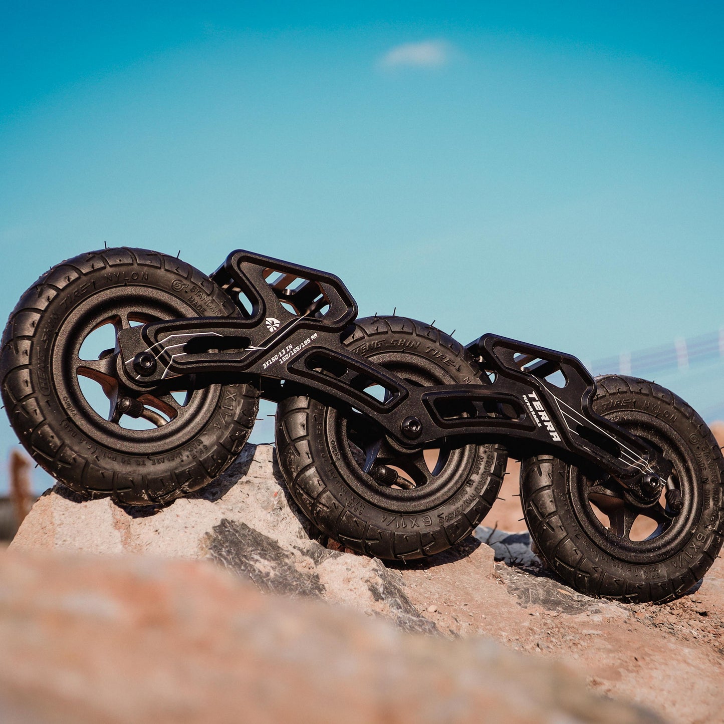 FlyingEagle TERRA TIRE 150mm black offroad frame on a rocky surface 