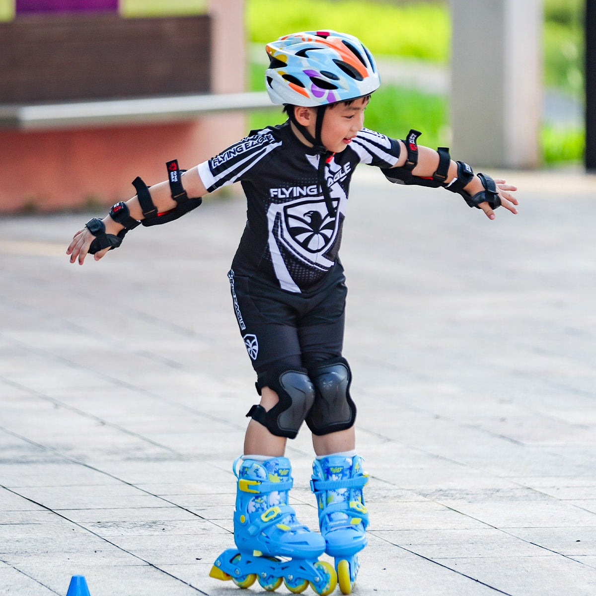 Little kid enjoying leisure skating in urban park with adjustable NACHT skates