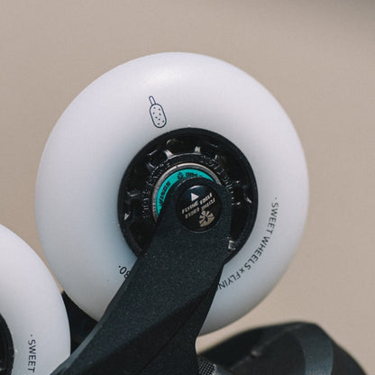 Display of matte and shiny white CROCANTI wheels by Flying Eagle stable rigid build for trick and speed skating