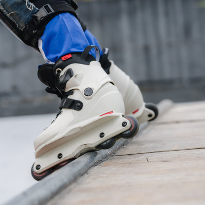 White FlyingEagle VIREO adjustable skates, skater staying on the edge of the bowl pool