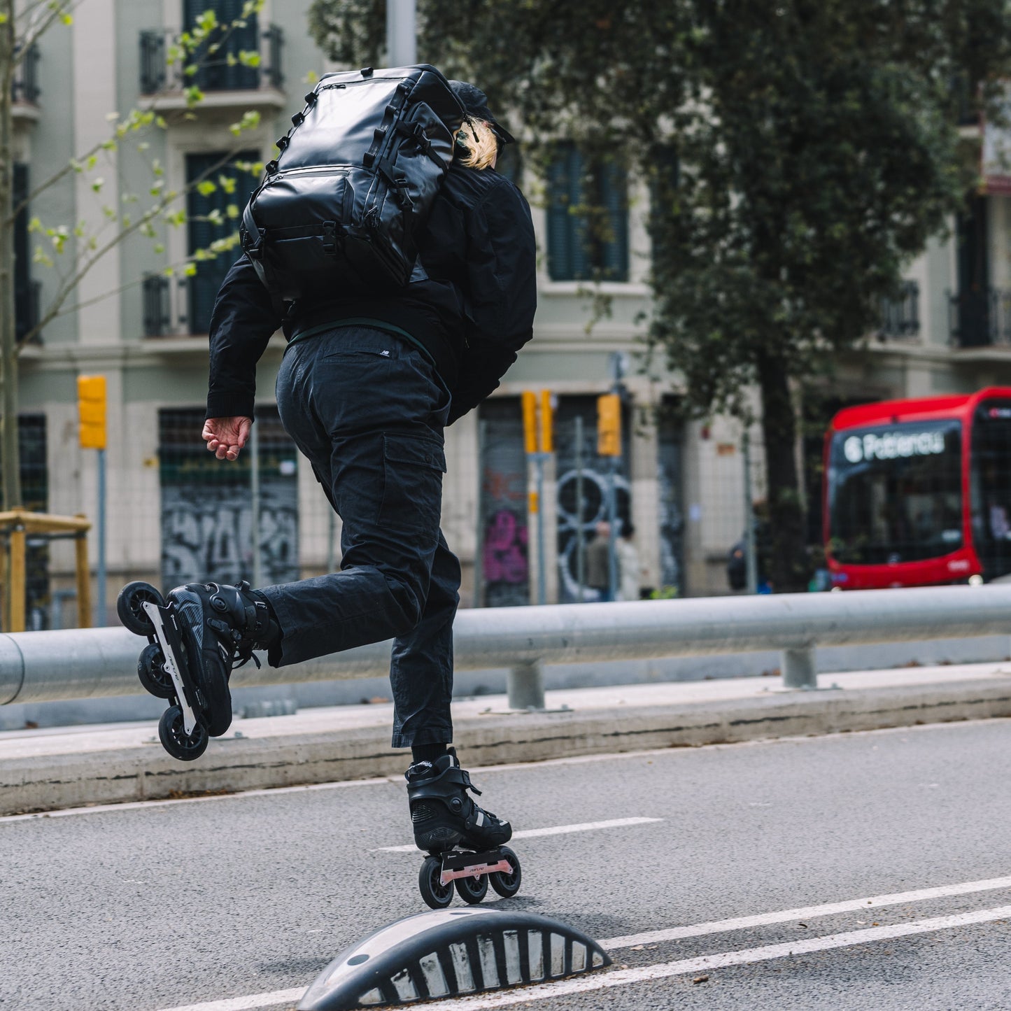 Person rollerblading on a city street with FlyingEagle SENSE T110