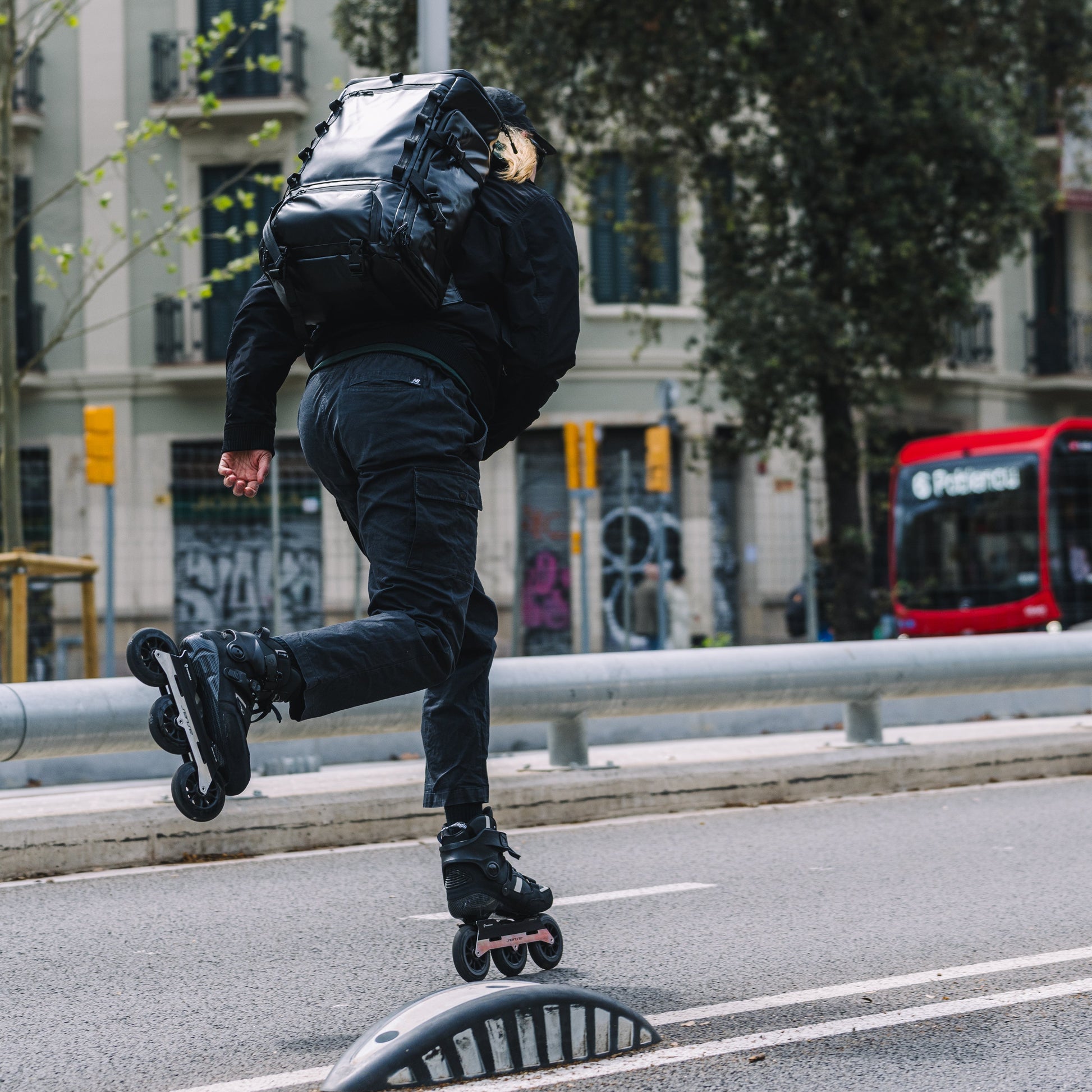 Person rollerblading on a city street with FlyingEagle SENSE T110