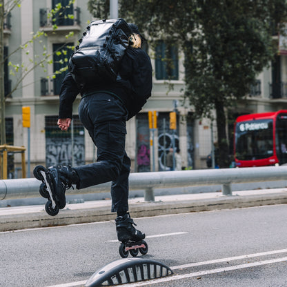 Person rollerblading on a city street with FlyingEagle SENSE T110