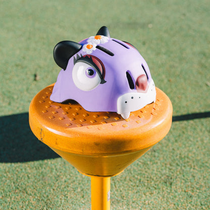 FlyingEagle KT purple panther helmet displayed on playground pavement