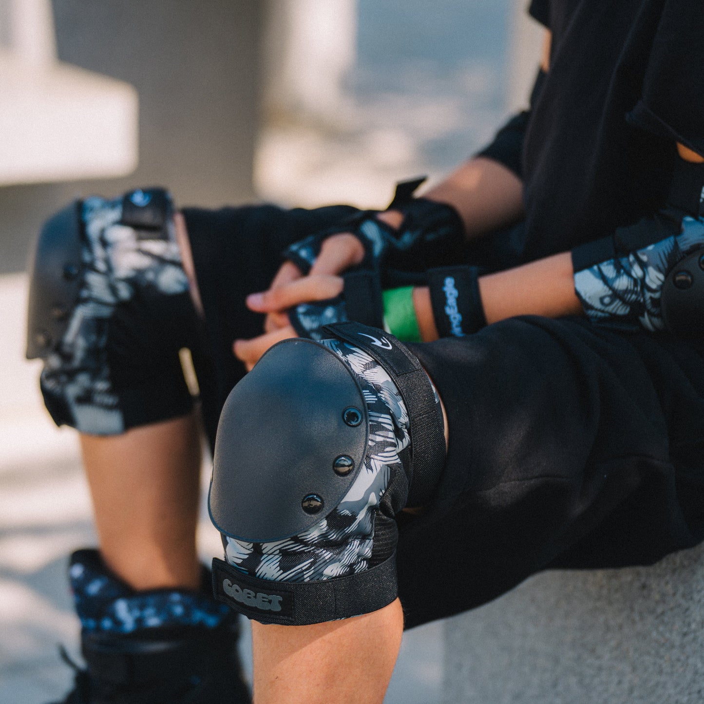 Person fitted with Flying Eagle COBET black ABS pads comfortable lycra cotton lining extreme sport protective set