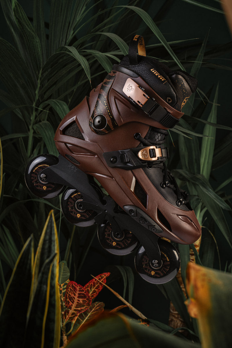 Brown adult FlyingEagle Optimum inline skates  with green leaves