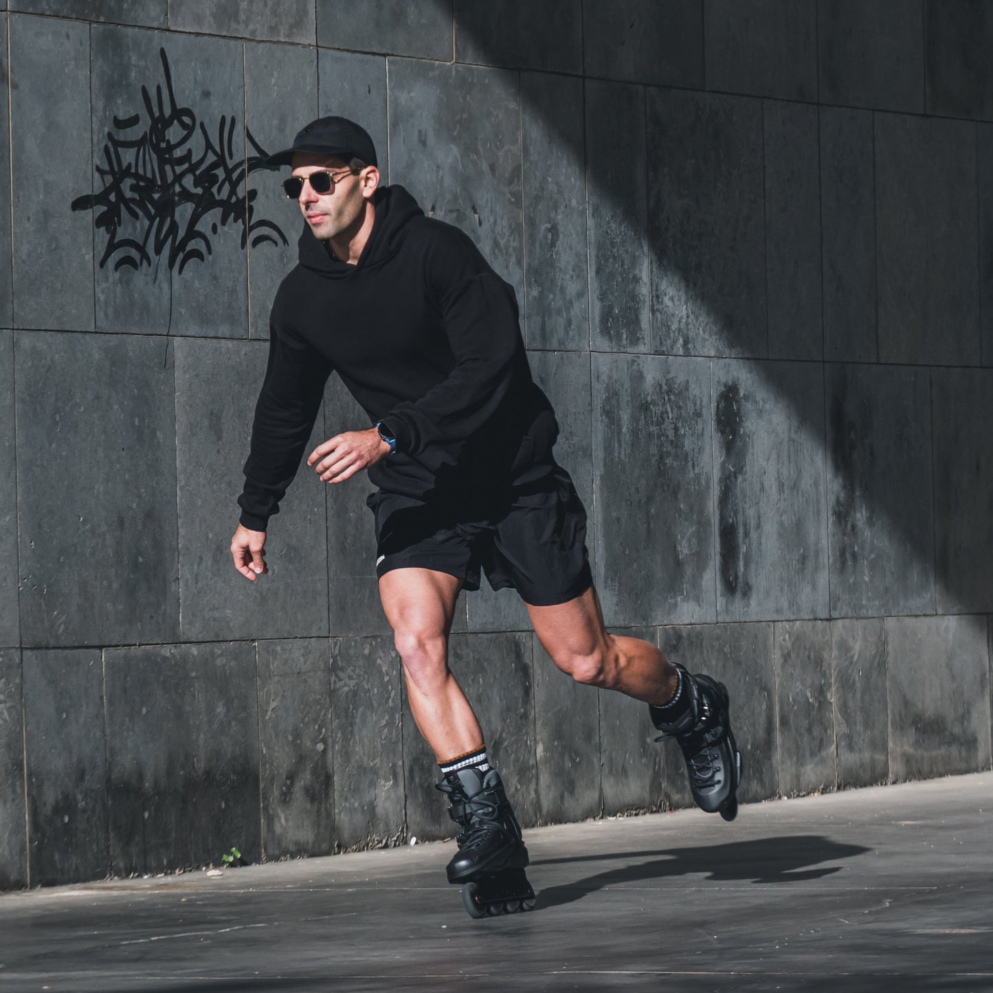 Adult riding FlyingEagle REAVER graphite inline skate, comfortable 4‑wheel urban fitness skating