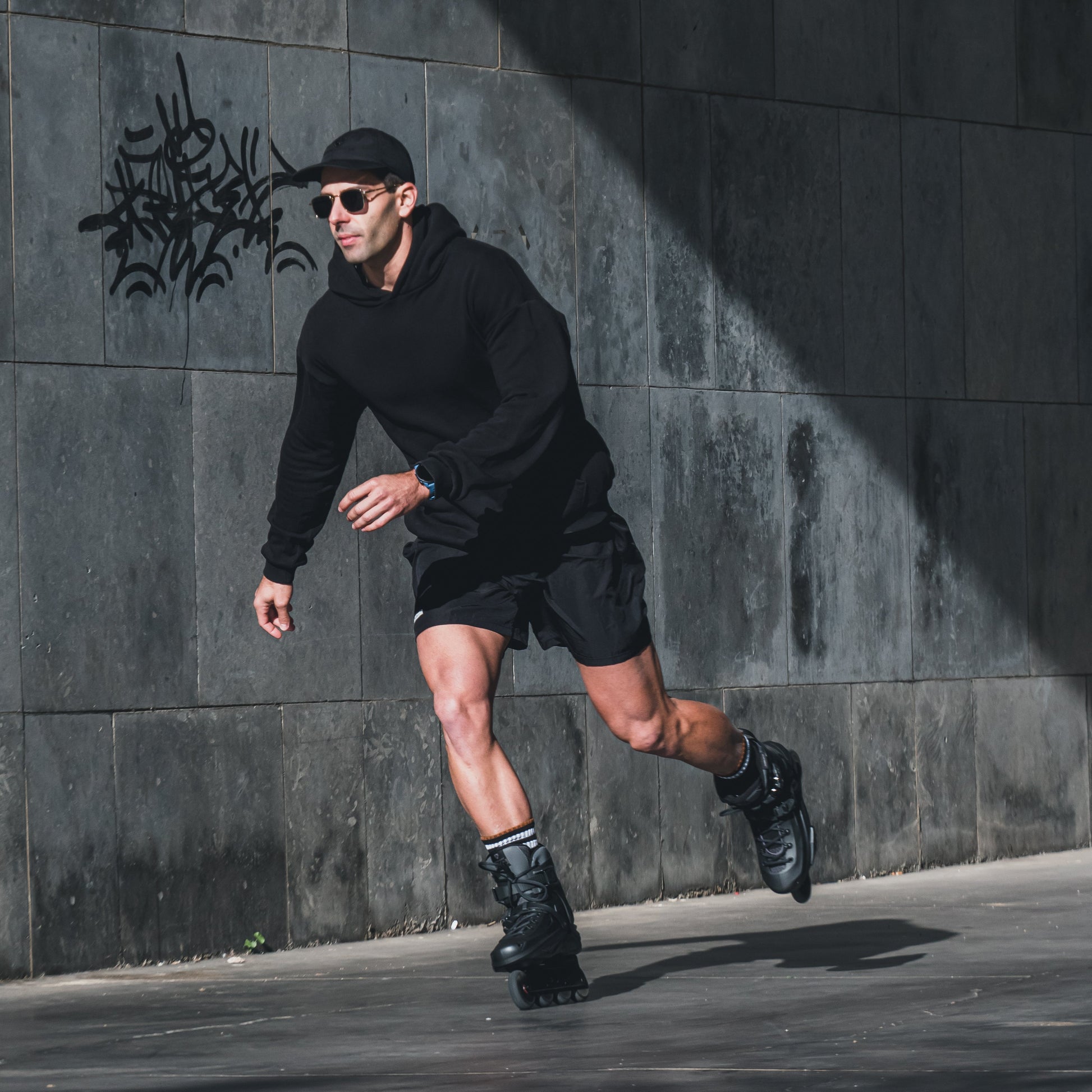 Adult riding FlyingEagle REAVER graphite inline skate, comfortable 4‑wheel urban fitness skating