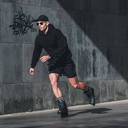 Adult riding FlyingEagle REAVER graphite inline skate, comfortable 4‑wheel urban fitness skating