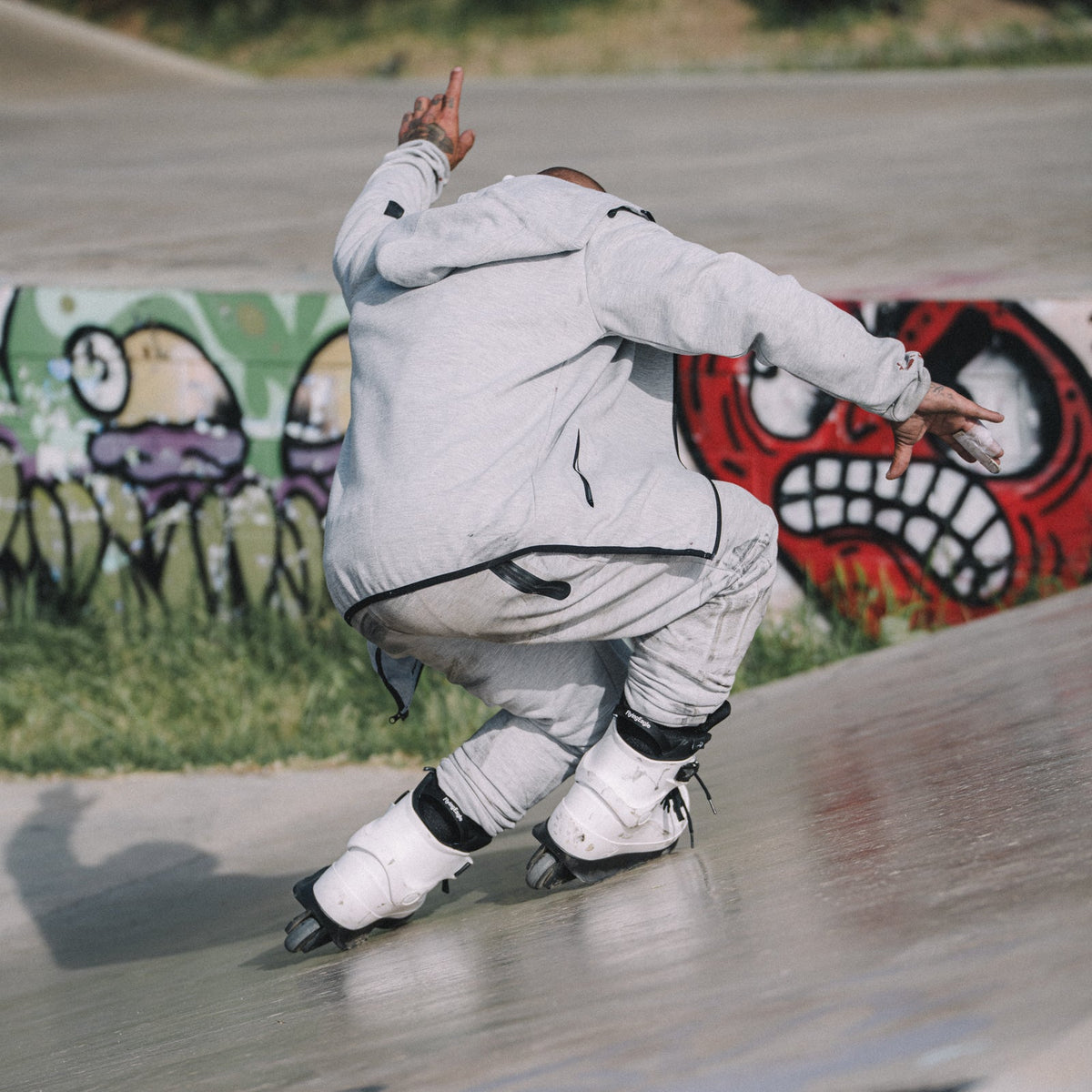 Skater doing aggressive skating tricks with Flying Eagle HERON SF60 White inline skates, 4 wheel flat setup skate