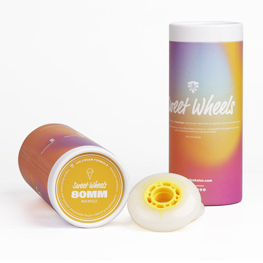 A set of ice cream FlyingEagle inline skate wheel, displayed alongside their packaging.