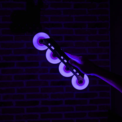 FlyingEagle LAZERWHEELZ ULTRA purple glowing wheel, rotation-triggered LED lights, fast and durable for freeskate skating.