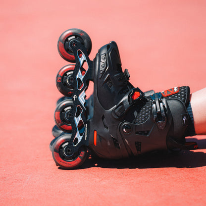 Kid model wearing Flying Eagle NIMBUS PRO black 4-wheel kids inline skates supportive fit for beginner skating training