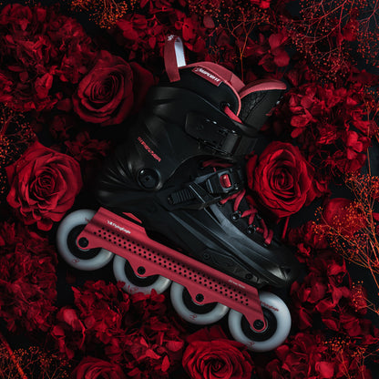 Flying Eagle REAVER S7680 ROSEresting on a bed of red roses and dried red botanicals against a dark background.