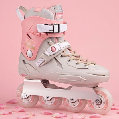 Flying Eagle SHRIKE SE peony pink adult inline skate boot with four translucent wheels, styled on a soft pink background with scattered pink flower petals.