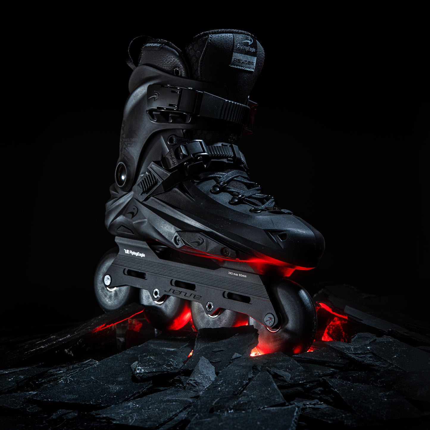 FlyingEagle REAVER Pro S7680 black urban skates placed on rocky ground