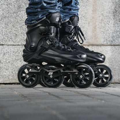Adult wearing FlyingEagle ReaverPro T110 Black X7T inline skates with 3*110mm wheel.